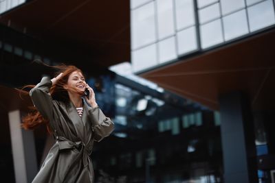 Young woman using mobile phone