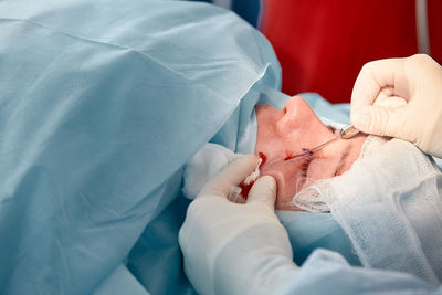 Midsection of woman holding hands