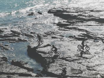 High angle view of rocks in sea