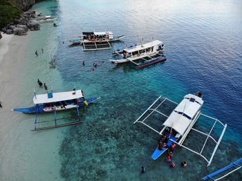 High angle view of people sailing on sea