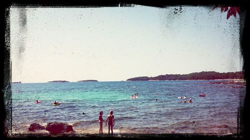 People enjoying at beach