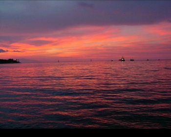 Scenic view of sea at sunset