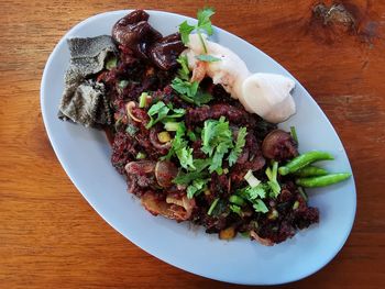 Food culture of thailand with some foods eaten raw. by bringing beef to eat raw