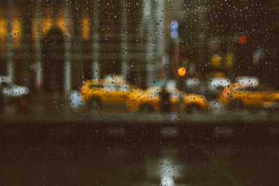 Close-up of wet windshield during rainy season