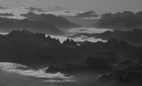 Scenic view of mountains against sky during sunset