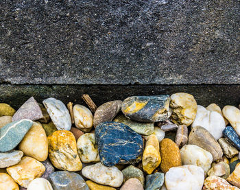 High angle view of stones on pebbles