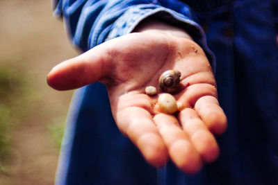 Close-up of man holding hands