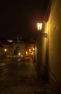 Illuminated street lights at night