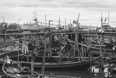 Fishing boats moored at harbor
