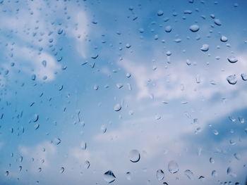 Full frame shot of wet glass window