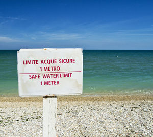 Safe water limit 1 meter advice on a beach. for graphical concept