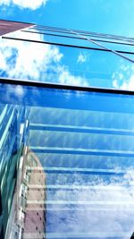 Low angle view of building against blue sky