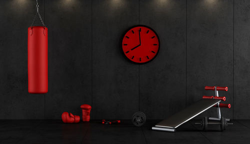 Exercise equipment against wall at gym