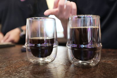 Close-up of beer glass on table