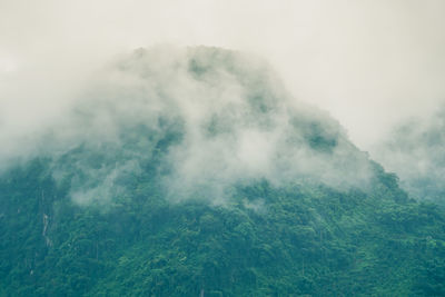 Aerial view of volcanic landscape against sky