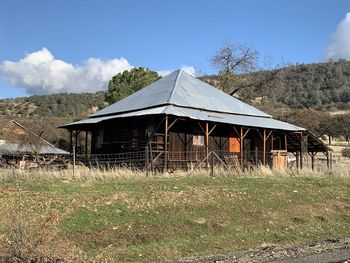 House on field against sky