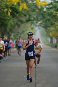 Woman running on road