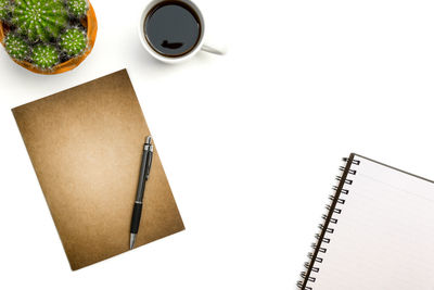 High angle view of coffee cup on table