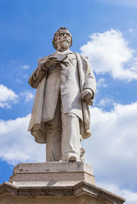 Low angle view of statue against sky