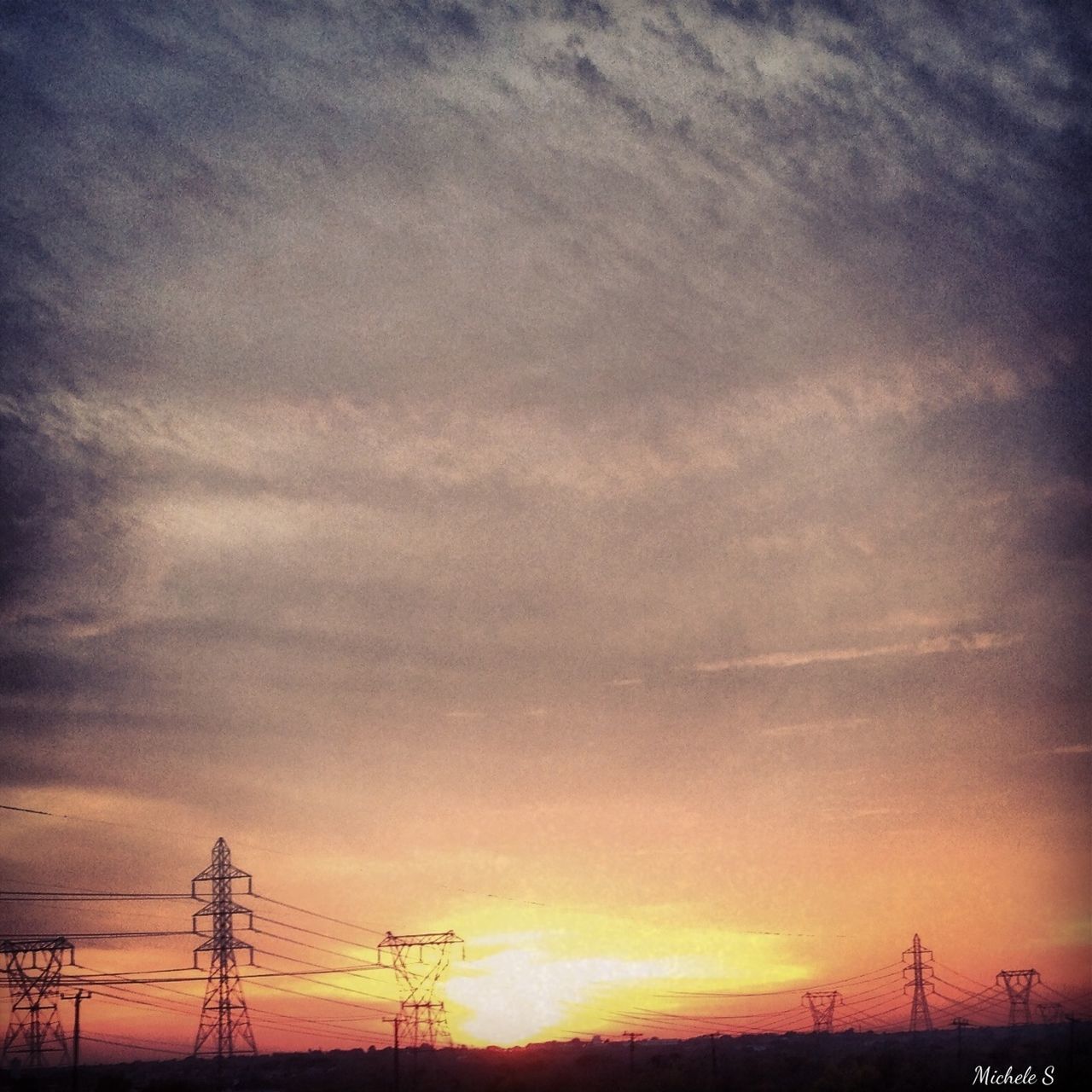 electricity pylon, power line, power supply, sunset, electricity, silhouette, fuel and power generation, connection, low angle view, sky, technology, cable, cloud - sky, orange color, power cable, dusk, nature, cloud, beauty in nature, tranquility