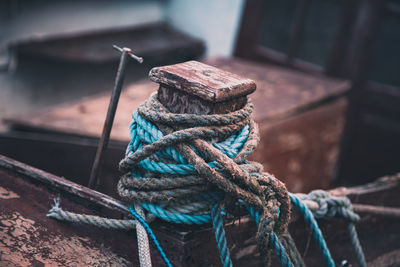 Close-up of rope tied on metal