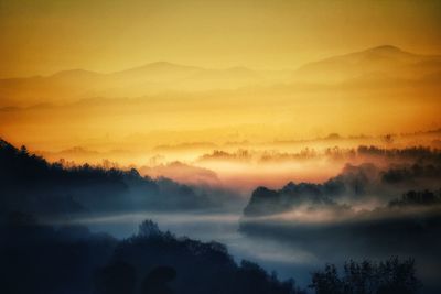 Scenic view of landscape during sunset