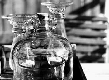 Close-up of glass bottle on table