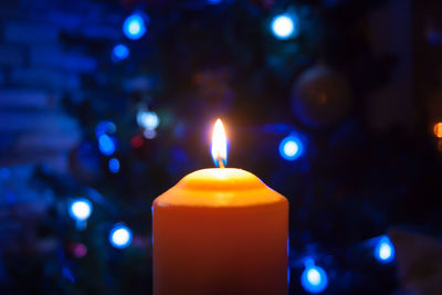Close-up of lit candle