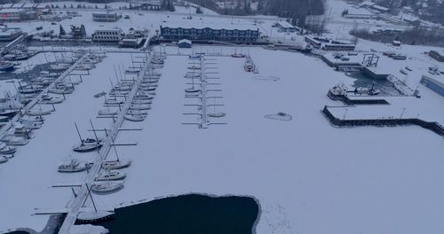 High angle view of snow covered cars