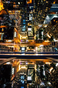 High angle view of illuminated city at night