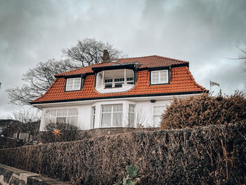 House against sky during winter