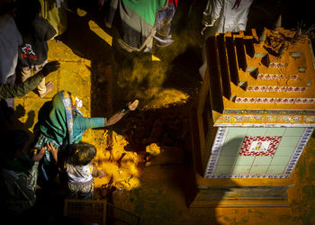 Group of people in temple outside building