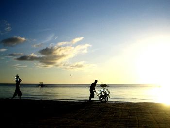 Scenic view of sea at sunset