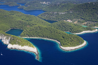 High angle view of island amidst sea