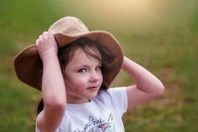 Portrait of cute girl in hat