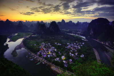 Scenic view of mountains against sky during sunset