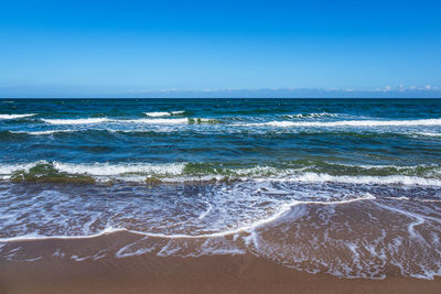 Scenic view of sea against clear sky