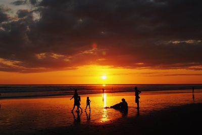 Scenic view of sea at sunset