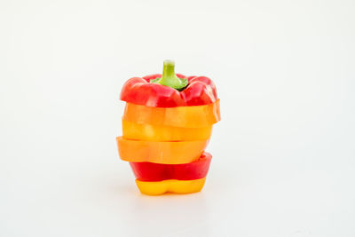 Close-up of red bell pepper against white background