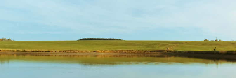 Scenic view of lake against sky