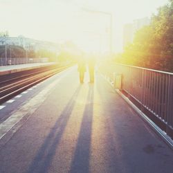 Woman walking on road