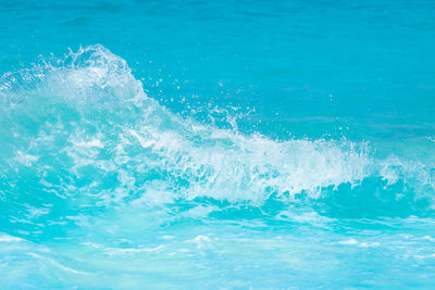 Close-up of waves splashing in swimming pool