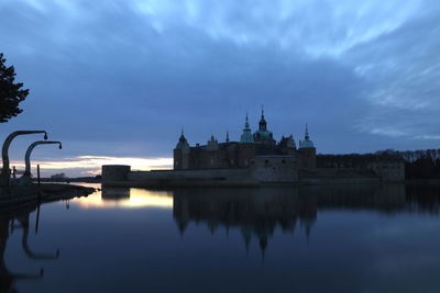 Reflection of buildings in lake