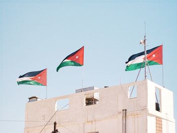 Low angle view of flag of jordan