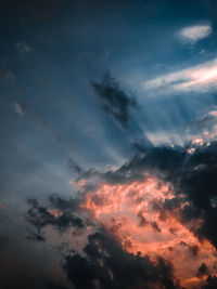 Low angle view of dramatic sky during sunset