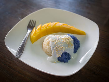 High angle view of breakfast served on table