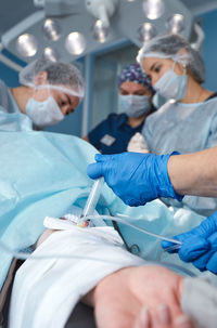 Midsection of man wearing mask