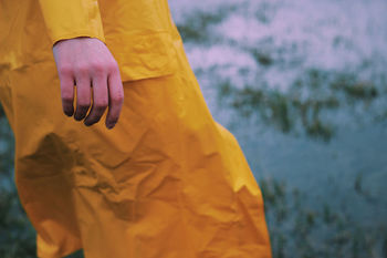 Low section of woman standing outdoors