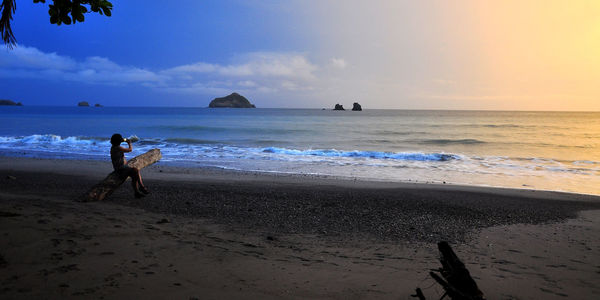 Scenic view of sea at sunset