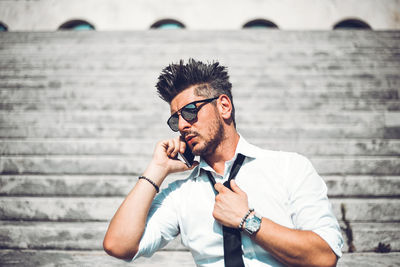 Portrait of young man wearing sunglasses